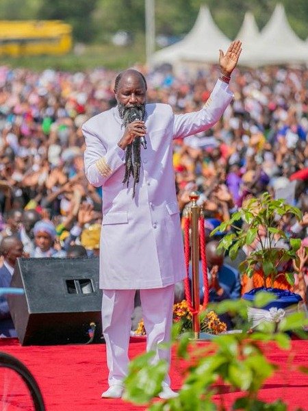 Prophet Dr. David Edward Owuor ministering before a revival crowd